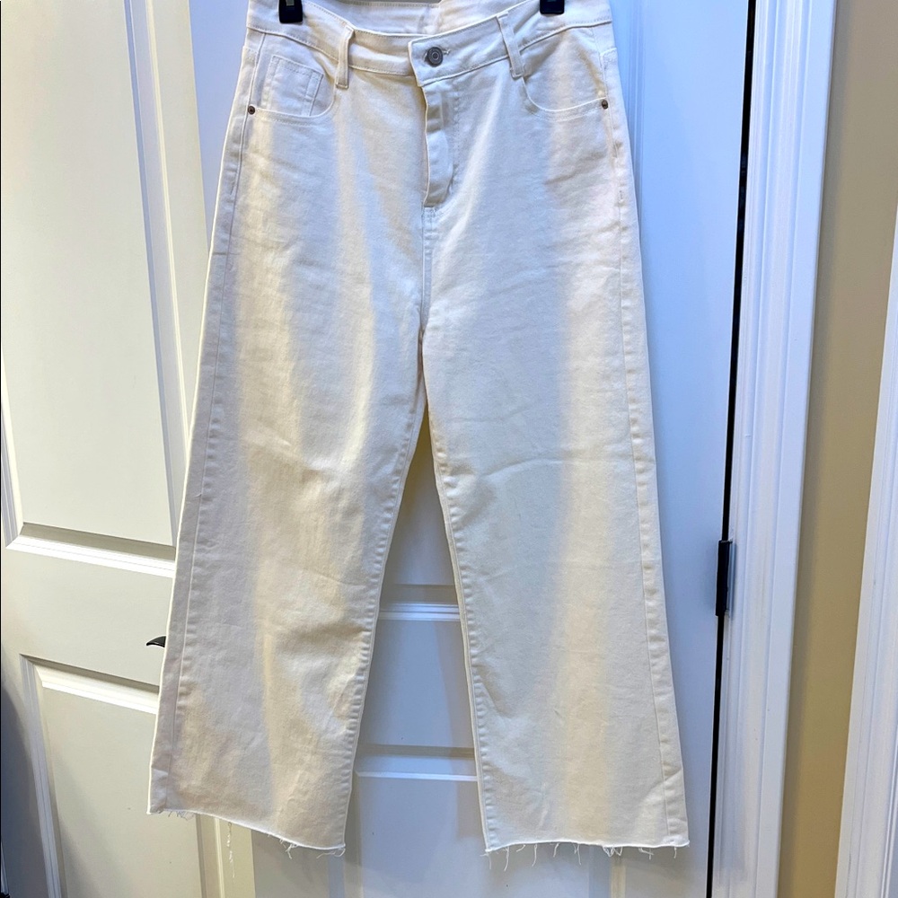 Wide leg cropped off white colored jeans